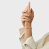 GEORG JENSEN - ARMRING, TORUN BANGLE GULT GULL MED DIAMANTER 0,08 CT. - STYLING HENNE