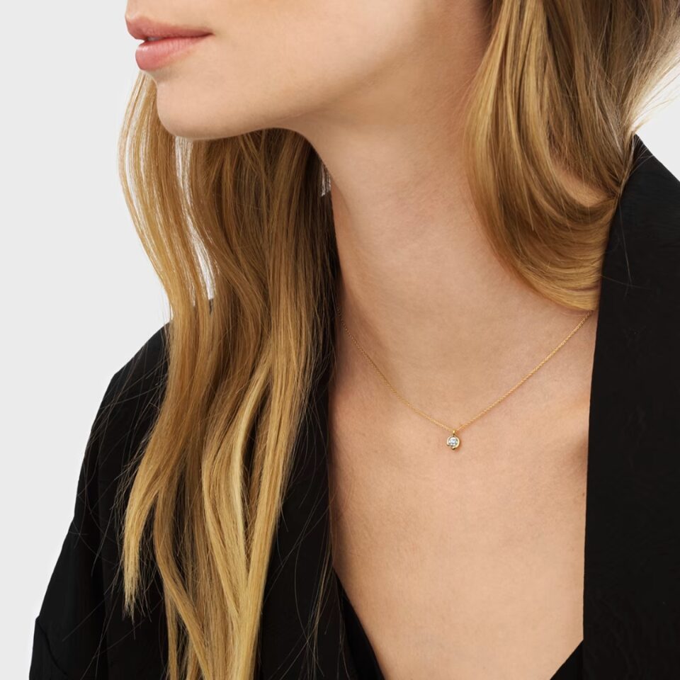 GEORG JENSEN - HALSKJEDE, MERCY MED DIAMANTER 0,20 CT. GULT GULL - STYLING